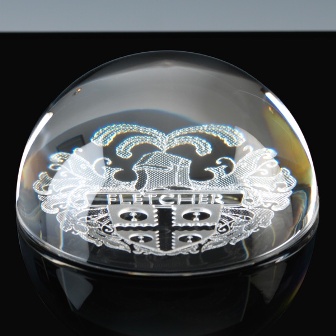 Crystal paperweight engraved with heraldic crest